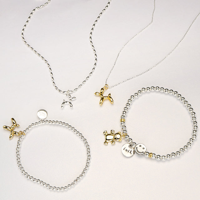 Balloon Dog silver jewelry consist of necklaces and bracelets.