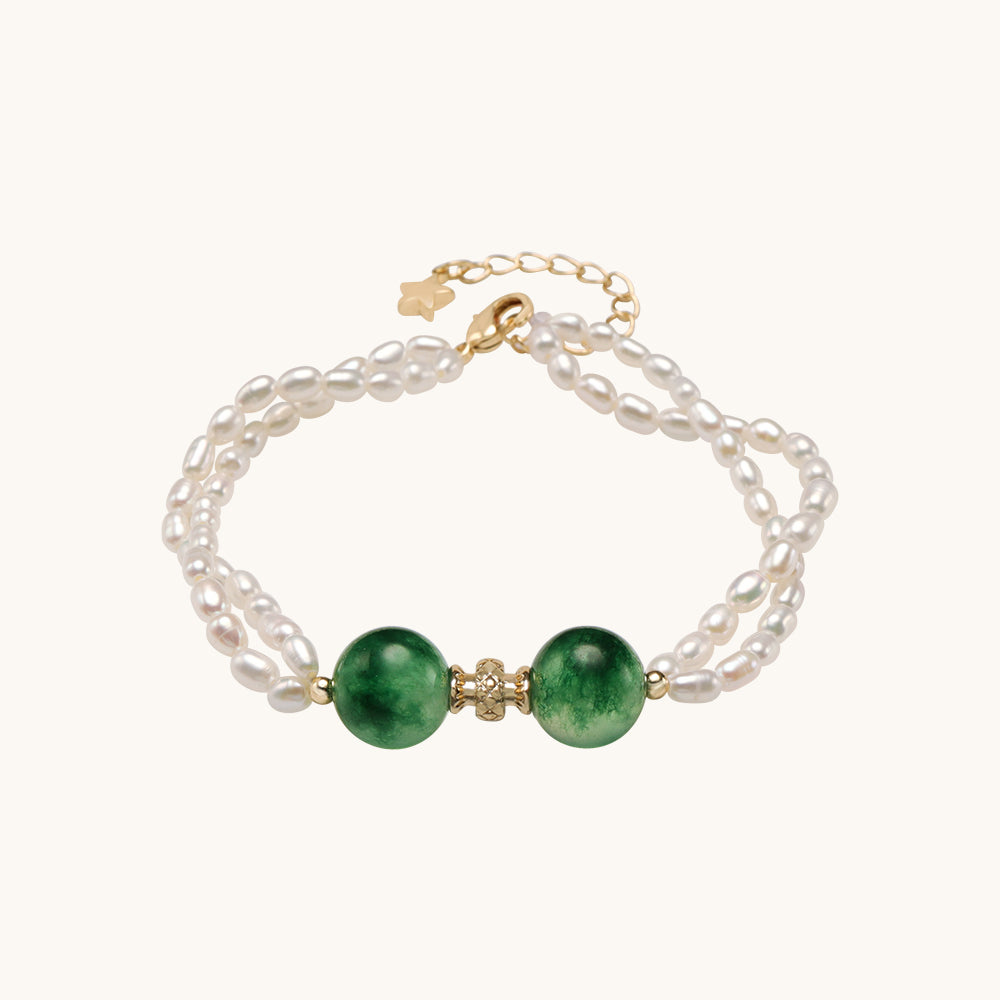 Green stone pearl bracelet.