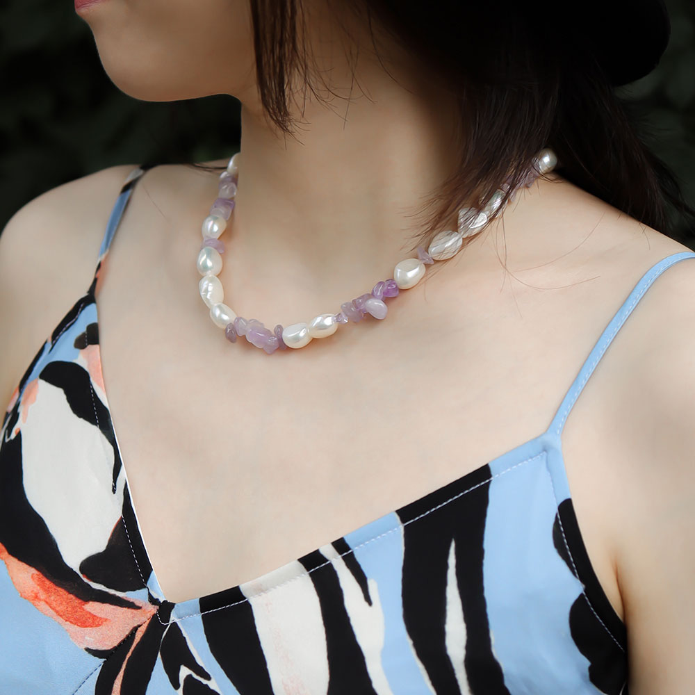 Women wear a amethyst stone necklace.