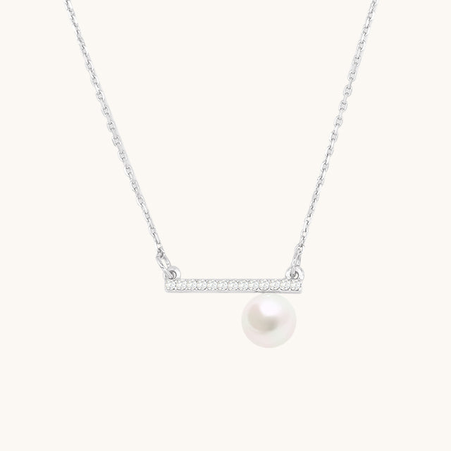 A diamond and pearl anniversary necklace.