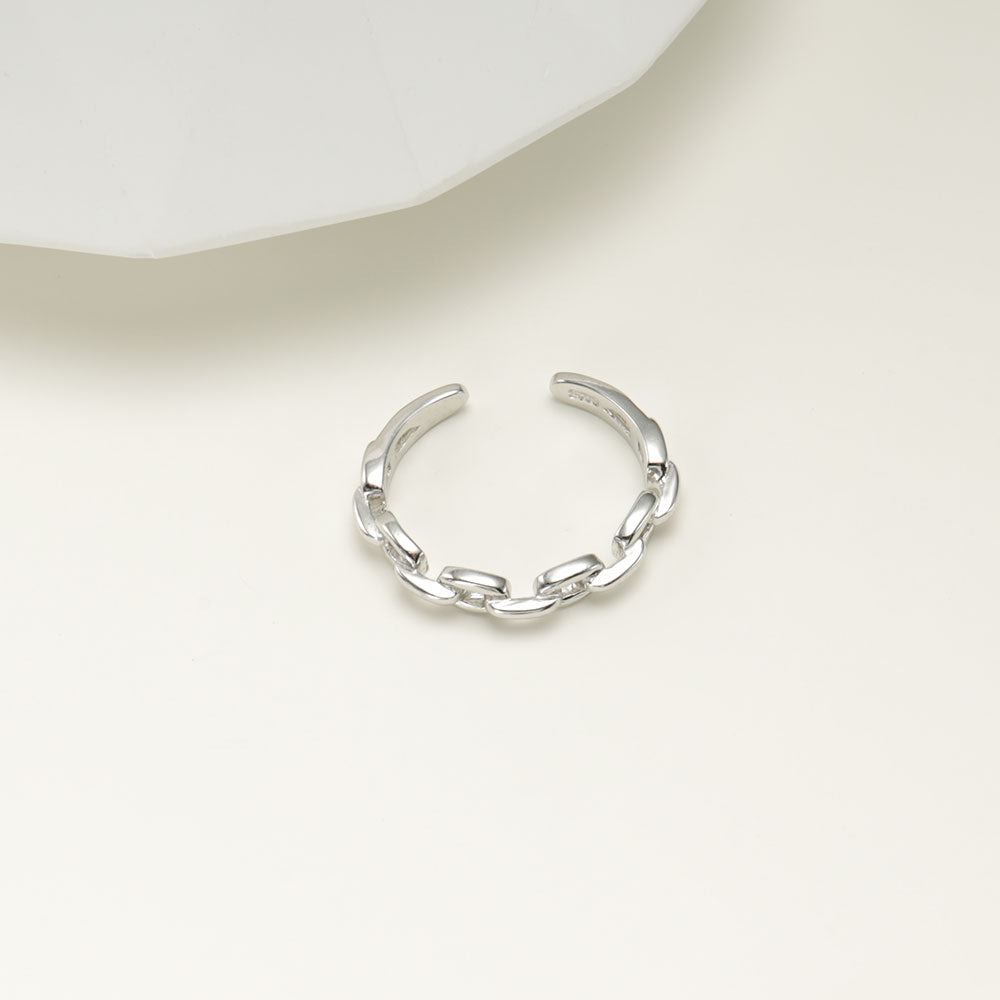 Silver chain ring.