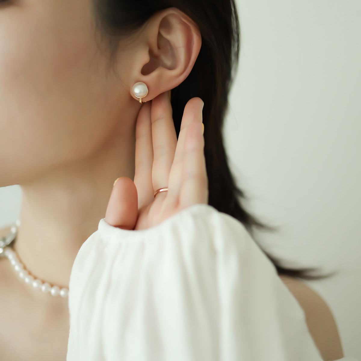 Clip on pearl earrings for women.