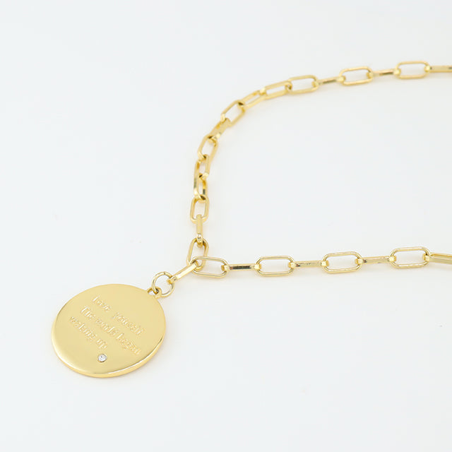 The back of coin necklace.