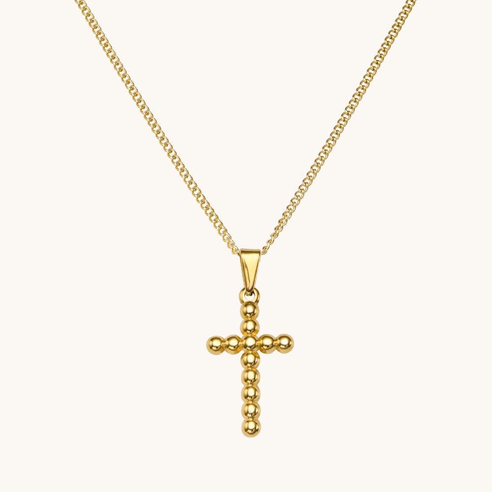 A cross necklace.