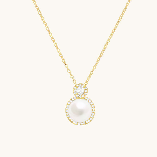 A dangling dainty pearl necklace.