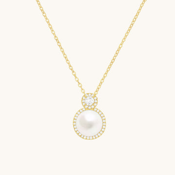 A dangling dainty pearl necklace.