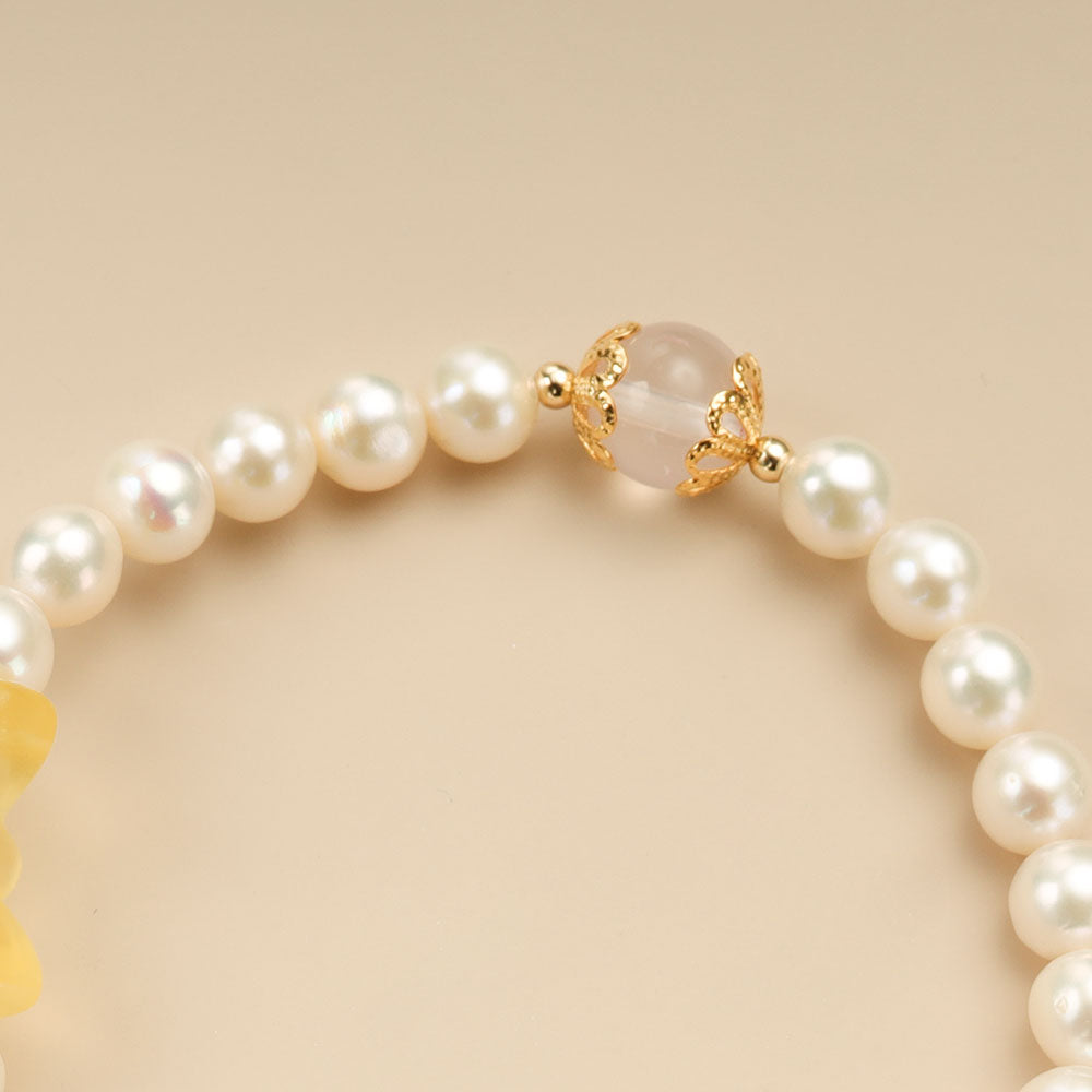 A elastic pearl bracelet.
