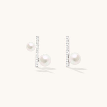 A pair of fashion pearl earrings for women.