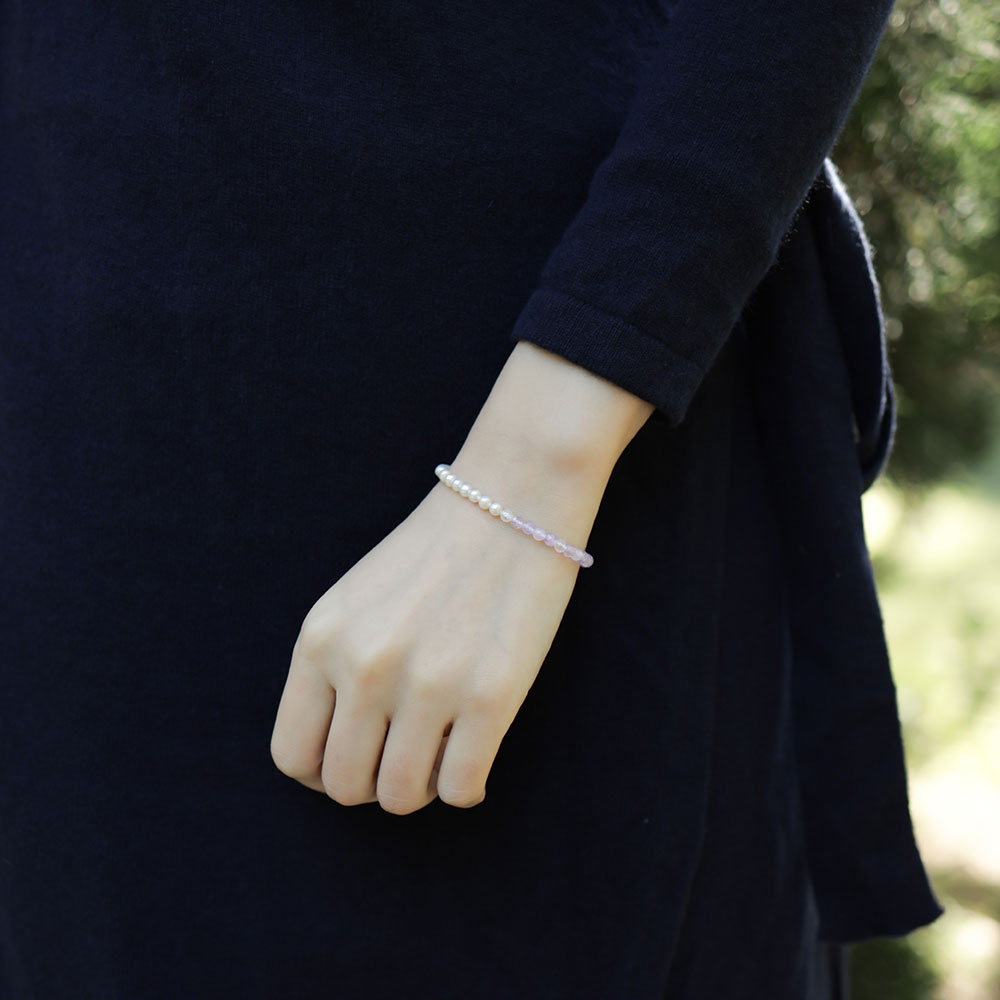 Women wear a february birthstone bracelet.