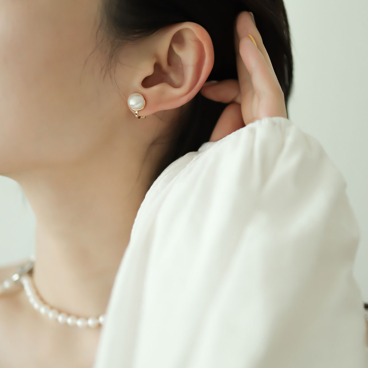 Women wear freshwater pearl clip on earrings.