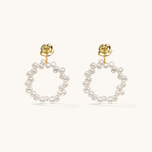 A pair of freshwater pearl earrings. 