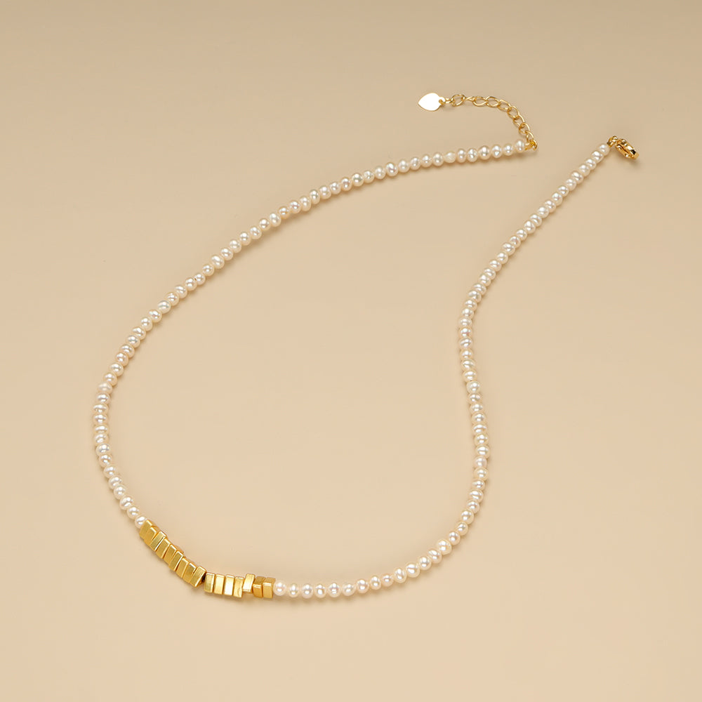 A genuine pearl necklace.