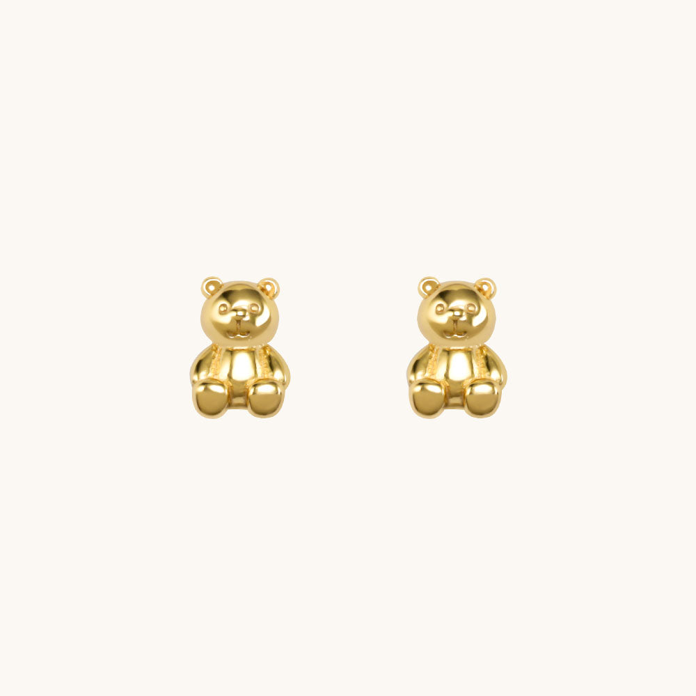 Gold bear earrings.