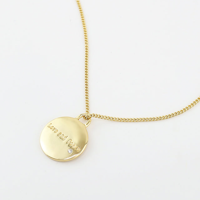 The back of gold coin pendant.