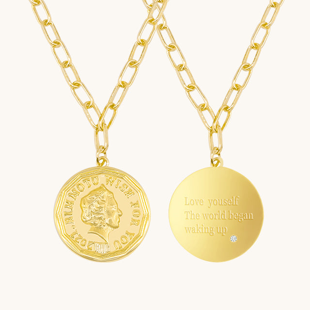 The front and back of gold coin pendant.