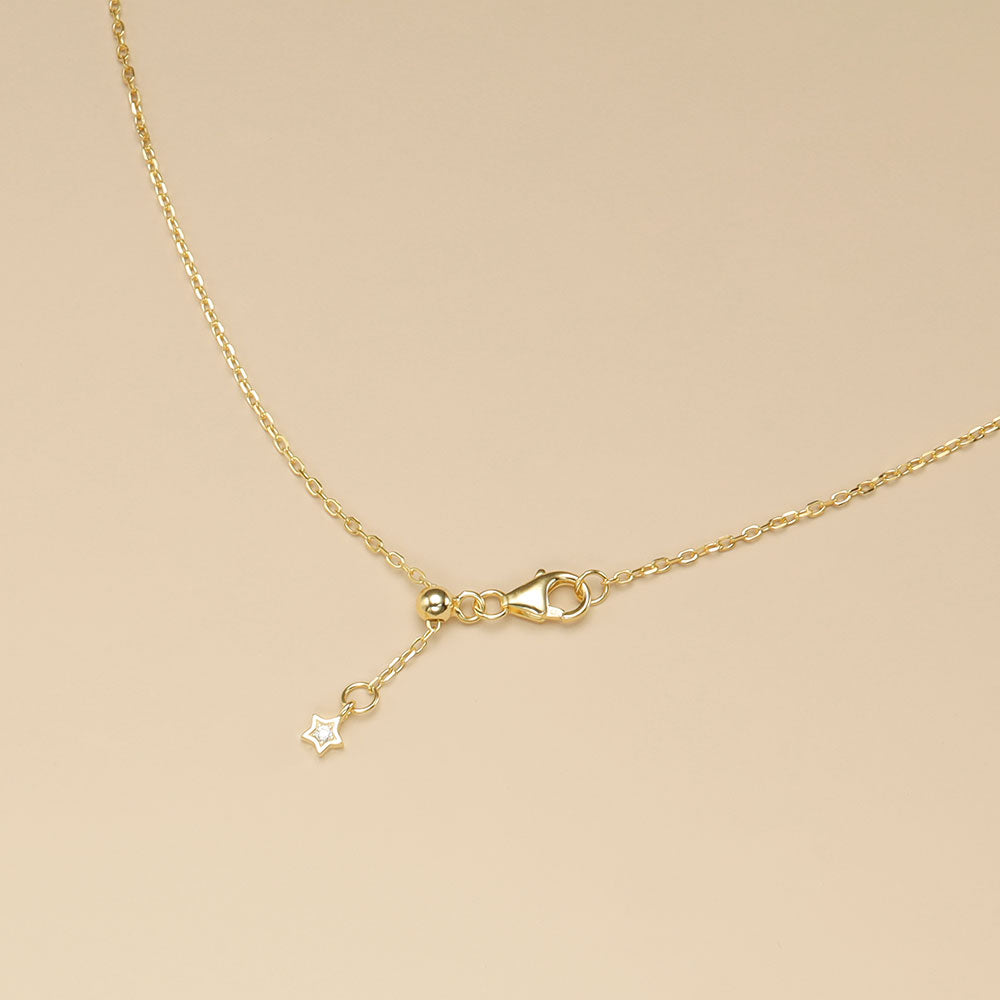 The adjustable clasp of gold plated necklace.