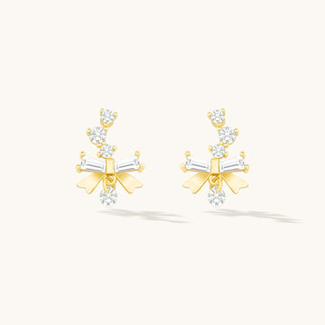 A pair of gold small earrings design.