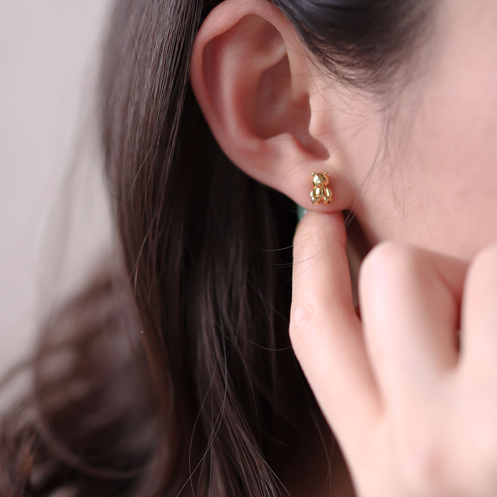 Gold stuf earrings for women.