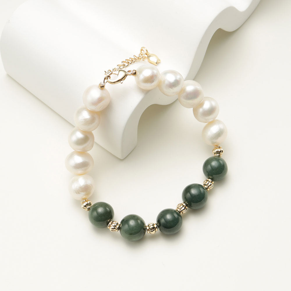 Green bracelet with gold beads.