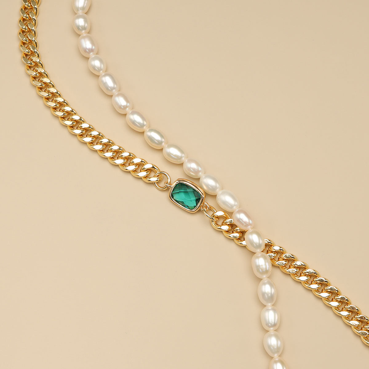 A green pearl bracelet.