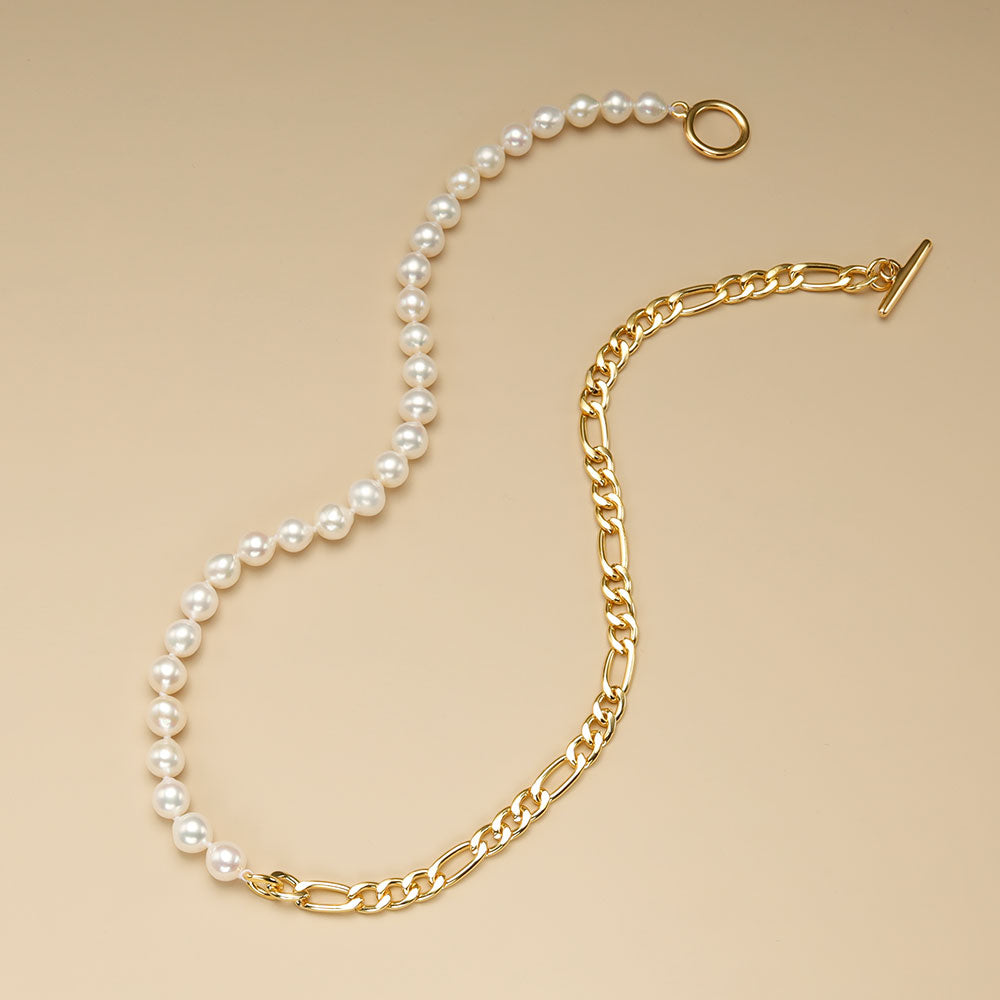 A half pearl chain necklace.