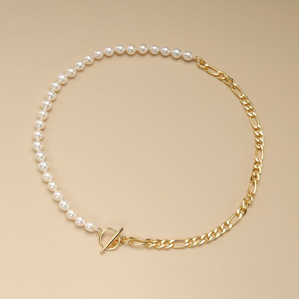 A half pearl half gold necklace.