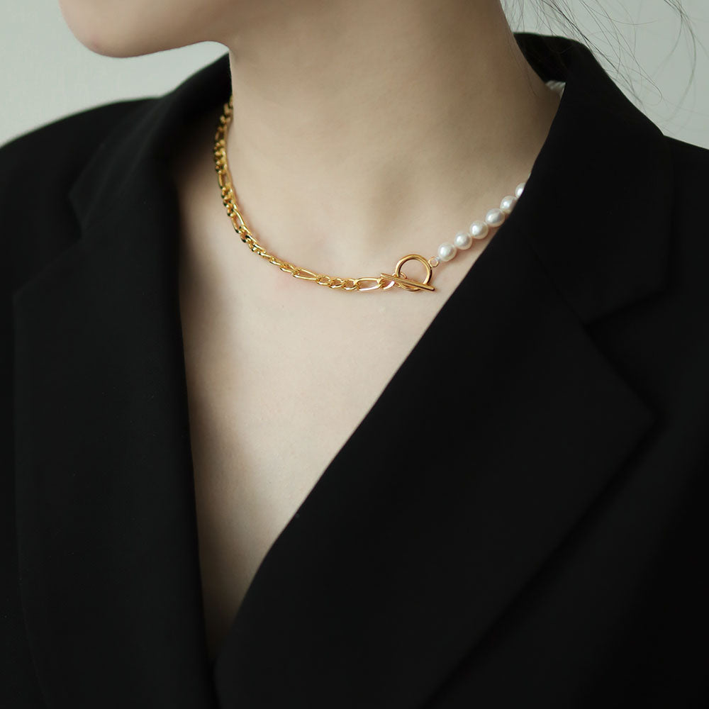 Women wear half pearl necklace.