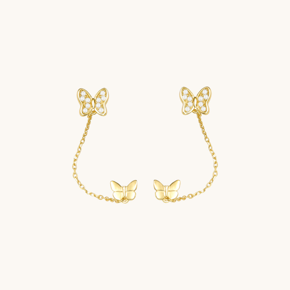 A pair of helix stud earrings.