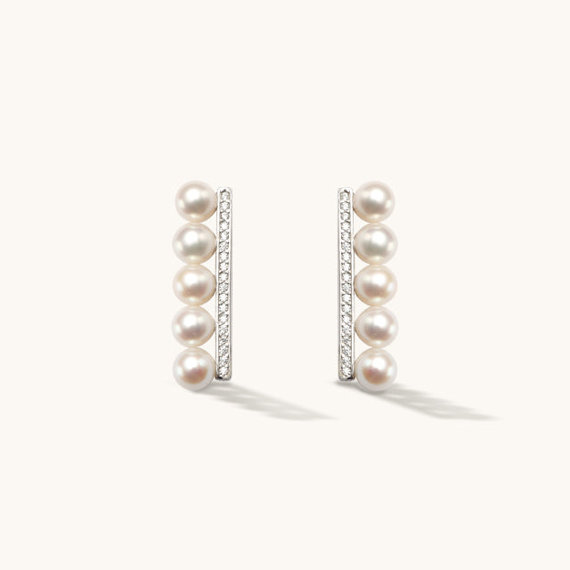 A pair of natural pearl earrings