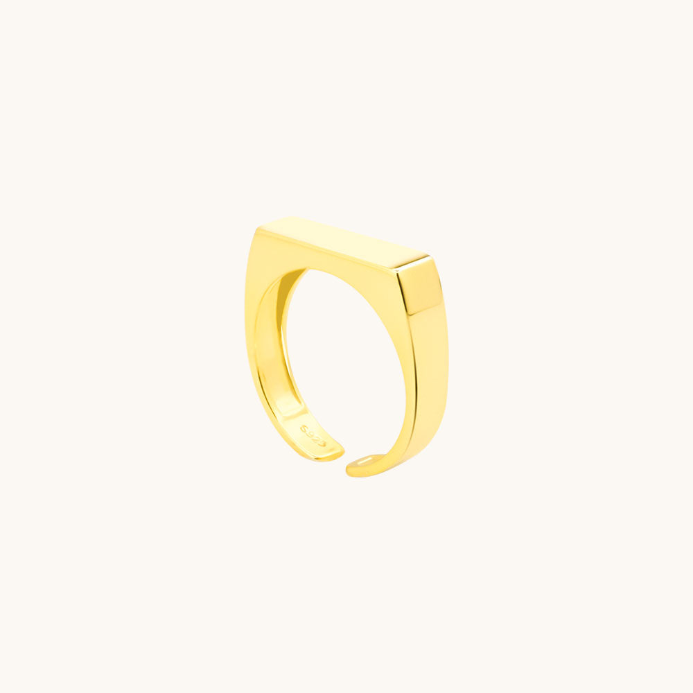 Gold open ring.