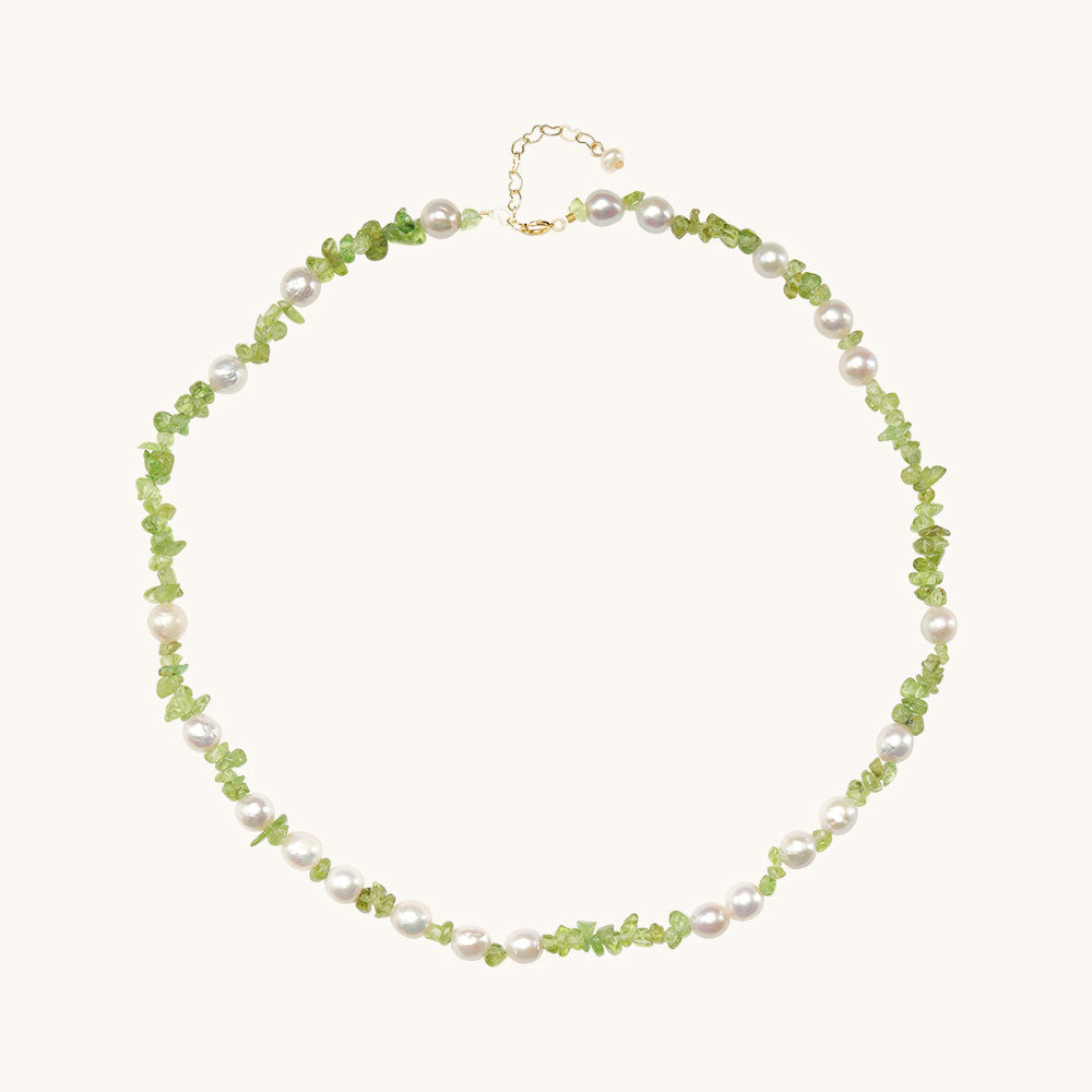 A peridot necklace with pearls.