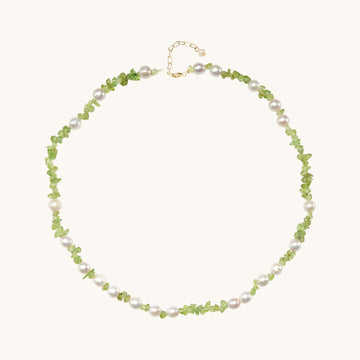 A peridot necklace with pearls.