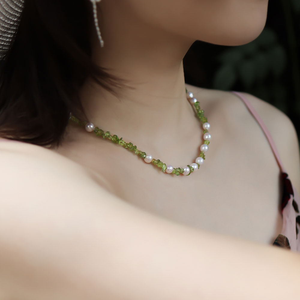 Women wear stone necklace.