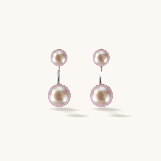 A pair of purple pearl front earrings.