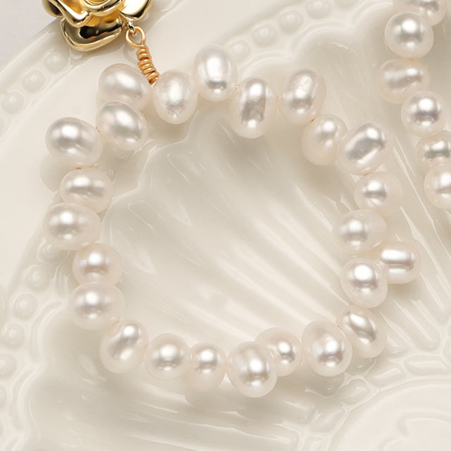A close shot pearl stud earrings.