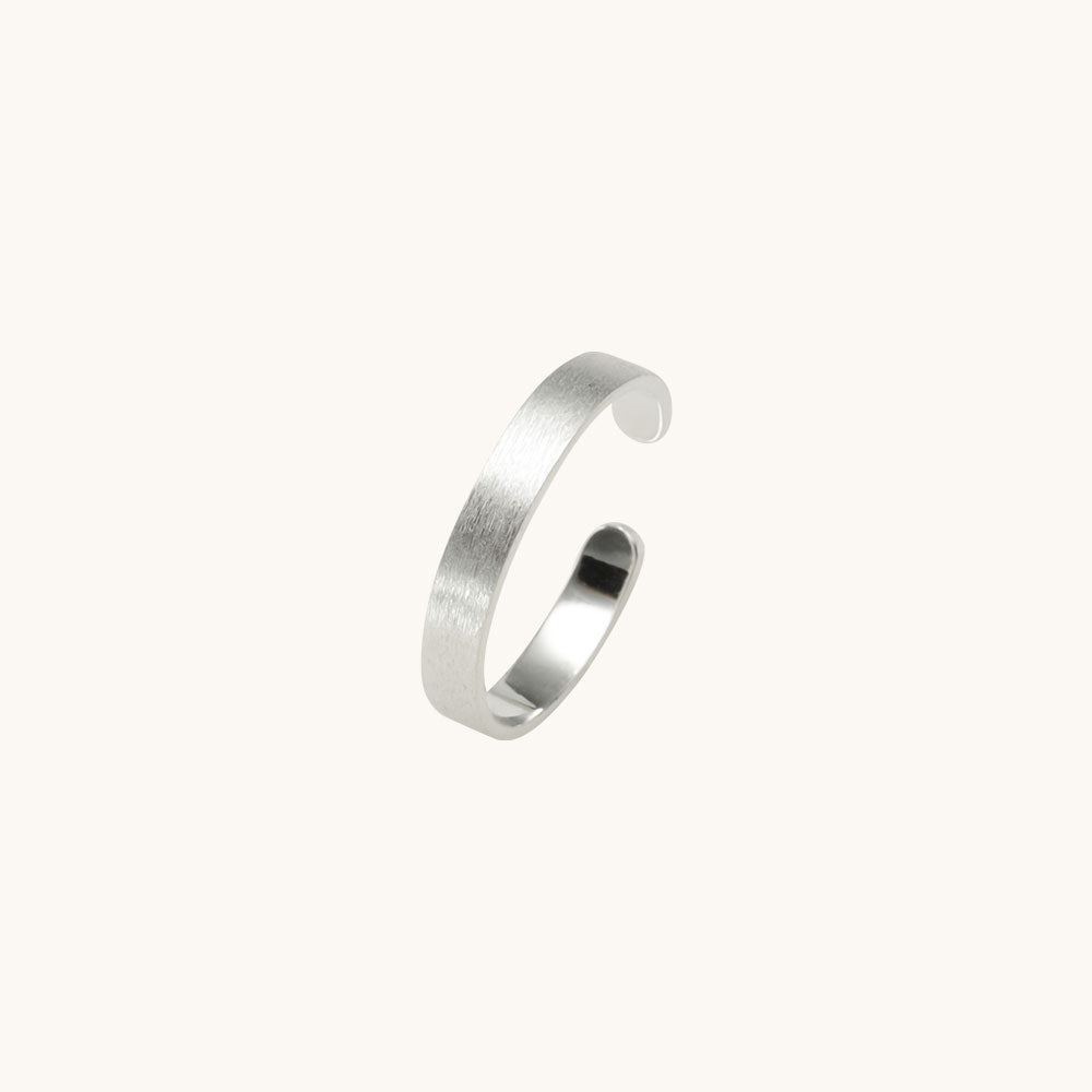 Silver band ring.