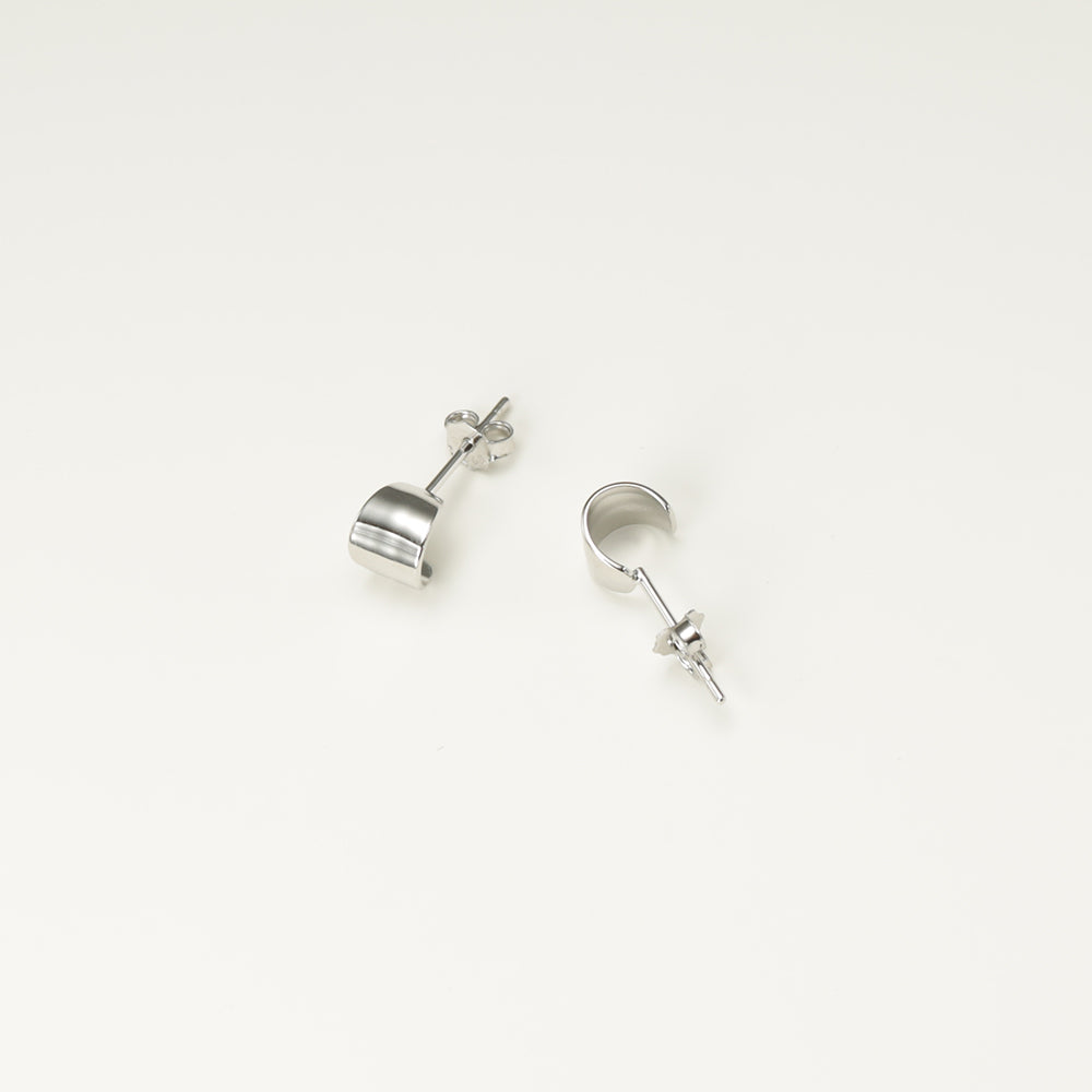 Silver stud earrings.