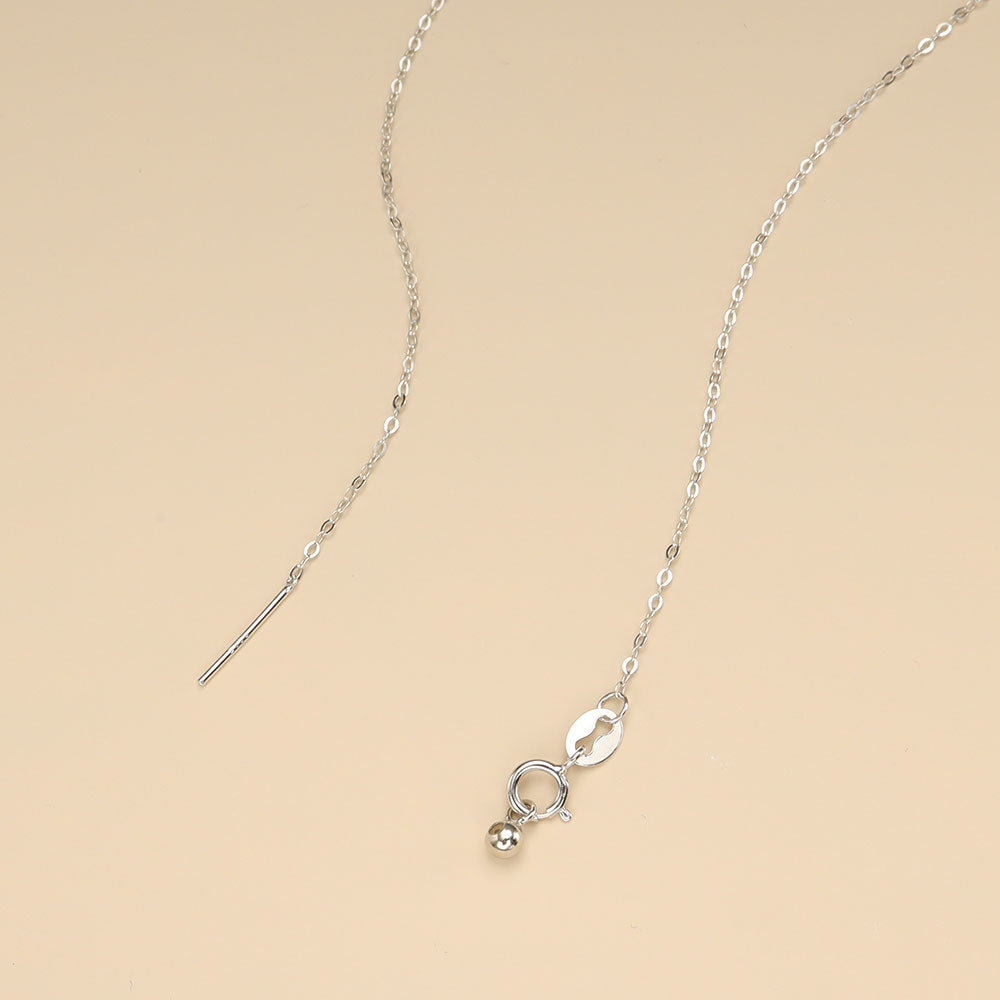 A opened simple silver chain.