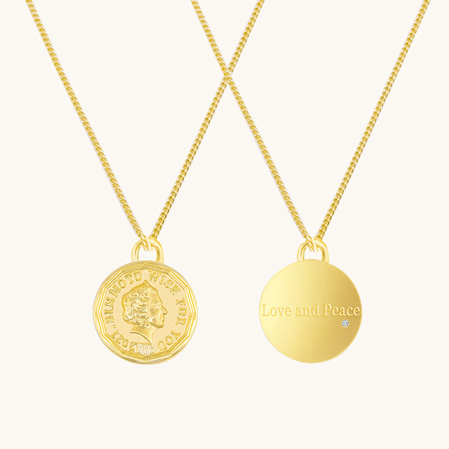 The front and back of small coin necklace.