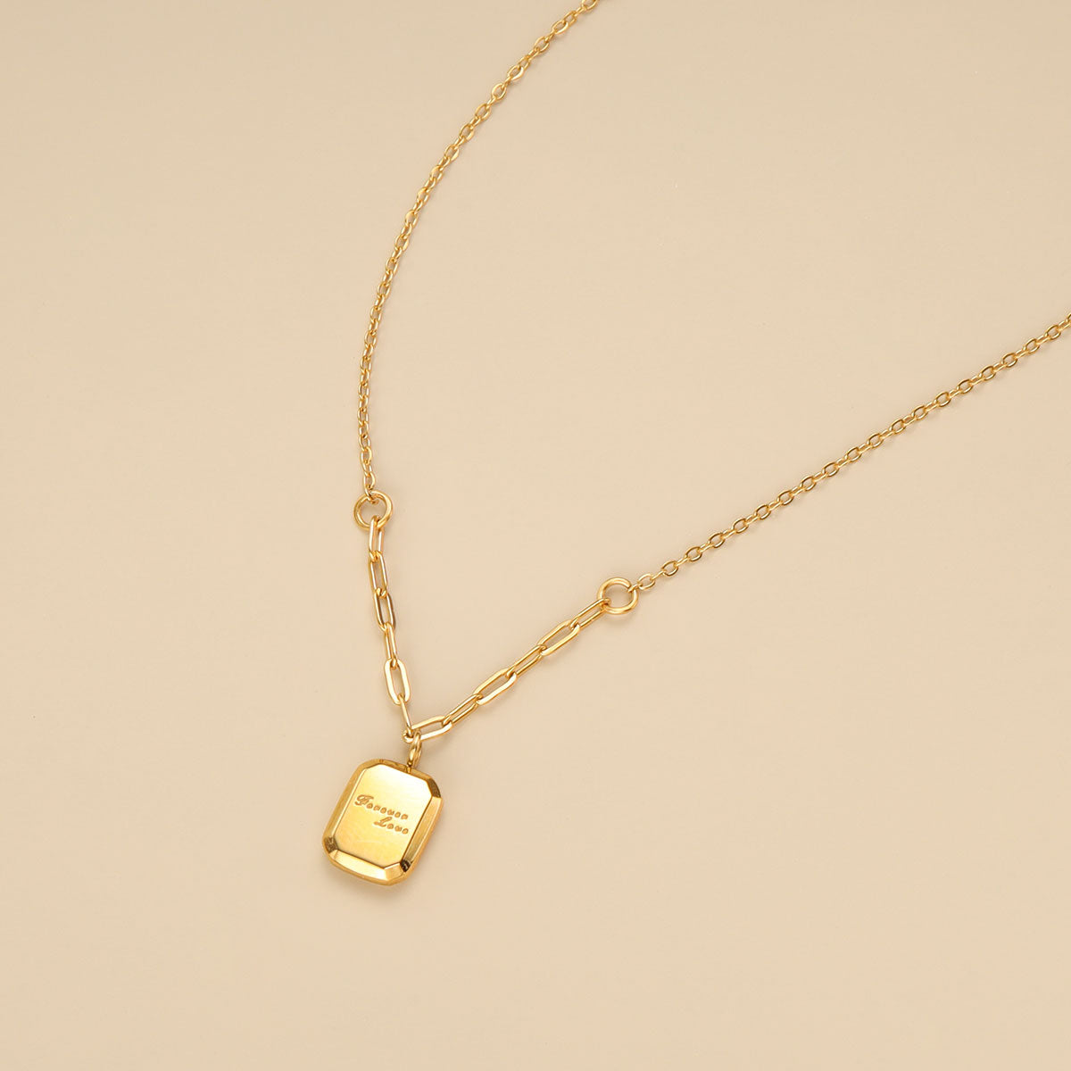 A small gold necklace.