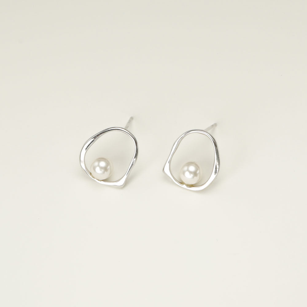 Small silver stud earrings.