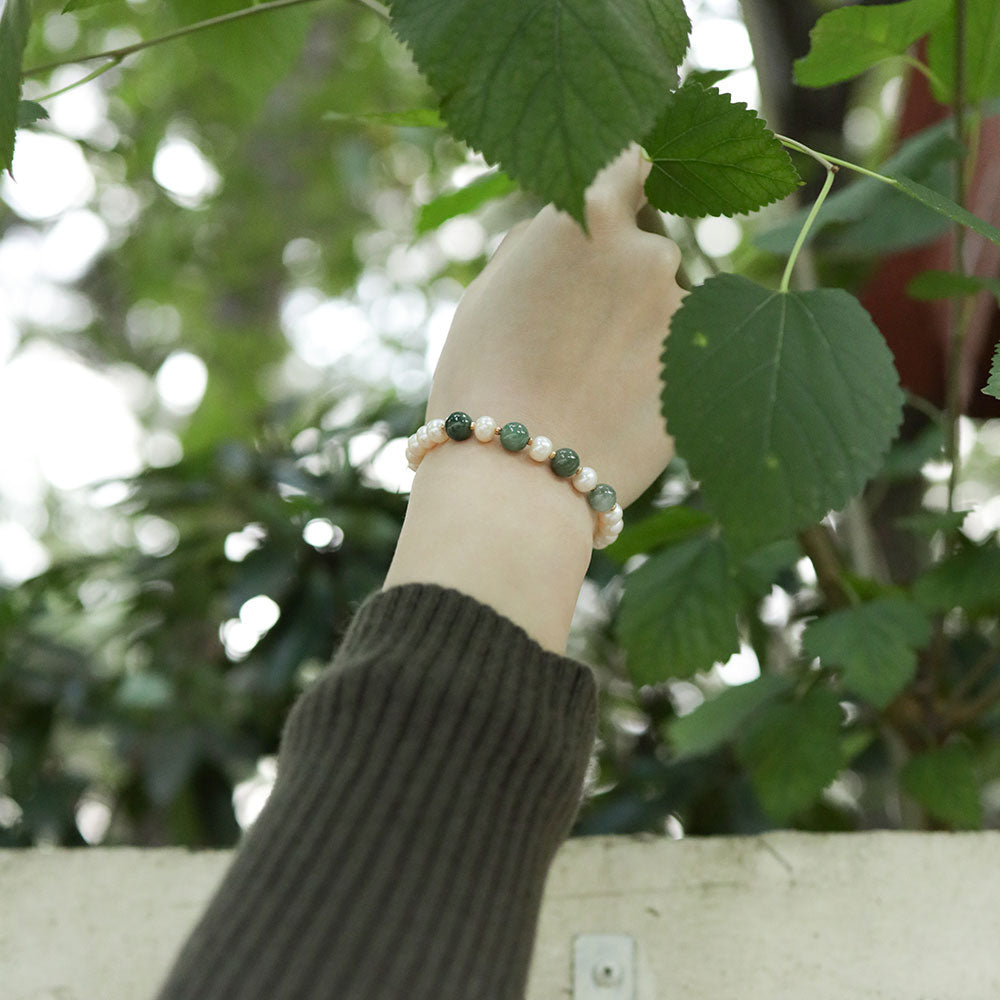 Women wear a spring bracelet.