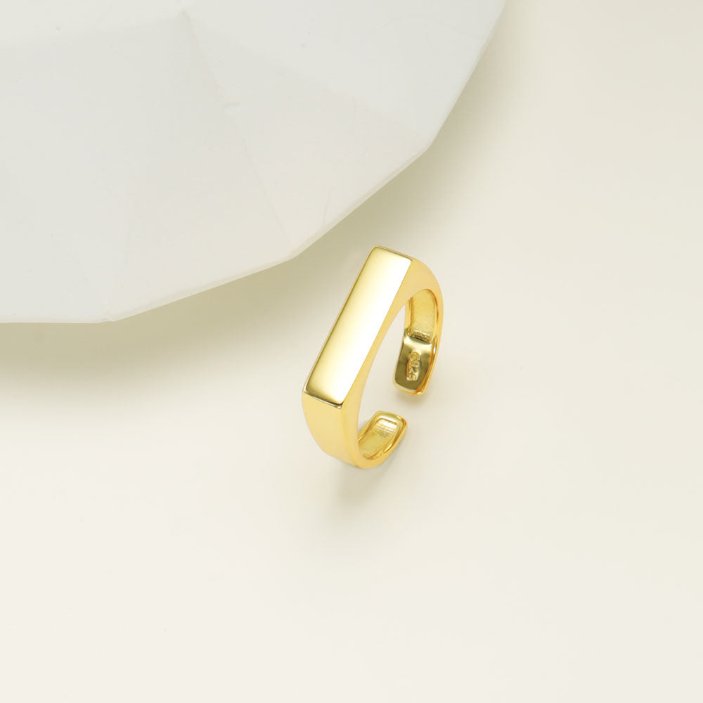 Gold square ring.