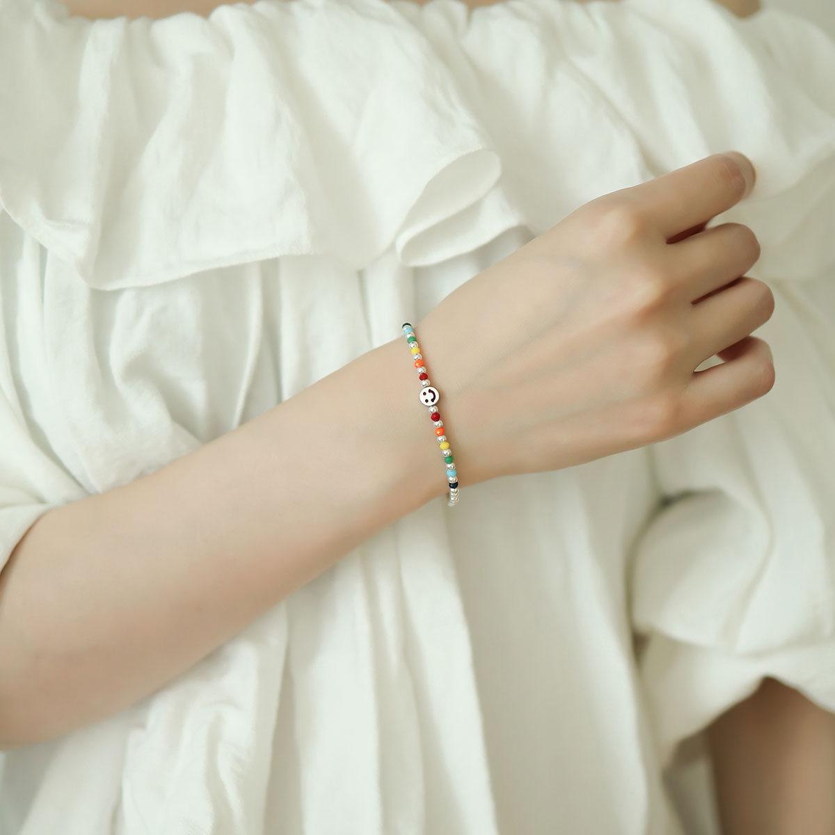 Women wear a sterling silver elasticated bracelet.