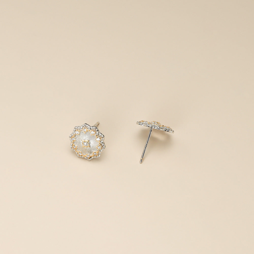 A pair of sterling silver stud earrings.