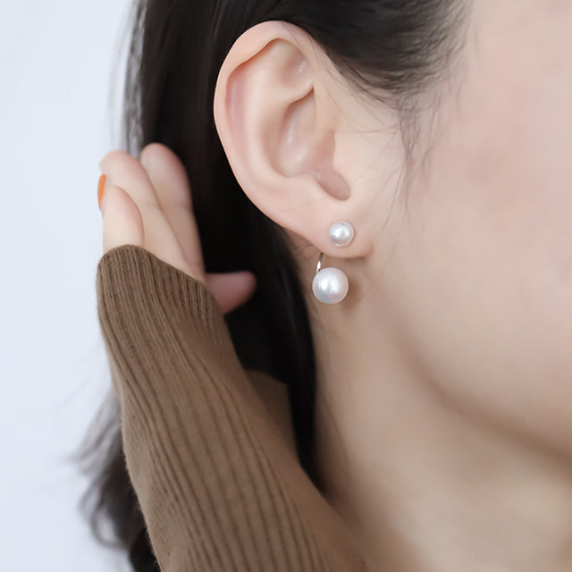 White pearl earrings for her.